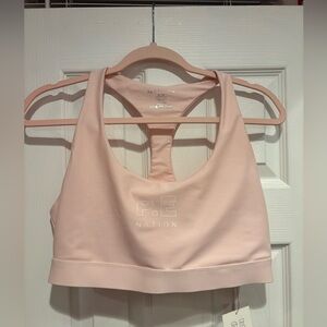 PE NATION baby pink sports bra